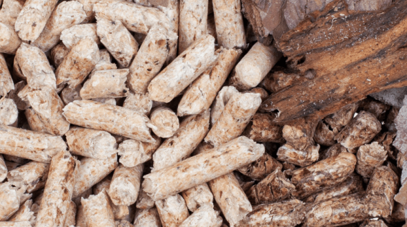 A close-up view of wood pellets and bark fragments, showcasing their texture and color variations
